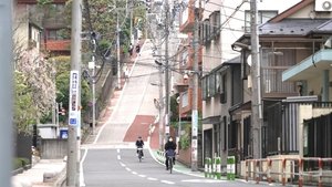 Journeys Up and Down a Steep Road in Tokyo