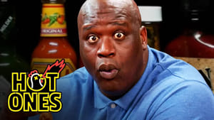 Shaq Tries to Not Make a Face While Eating Spicy Wings